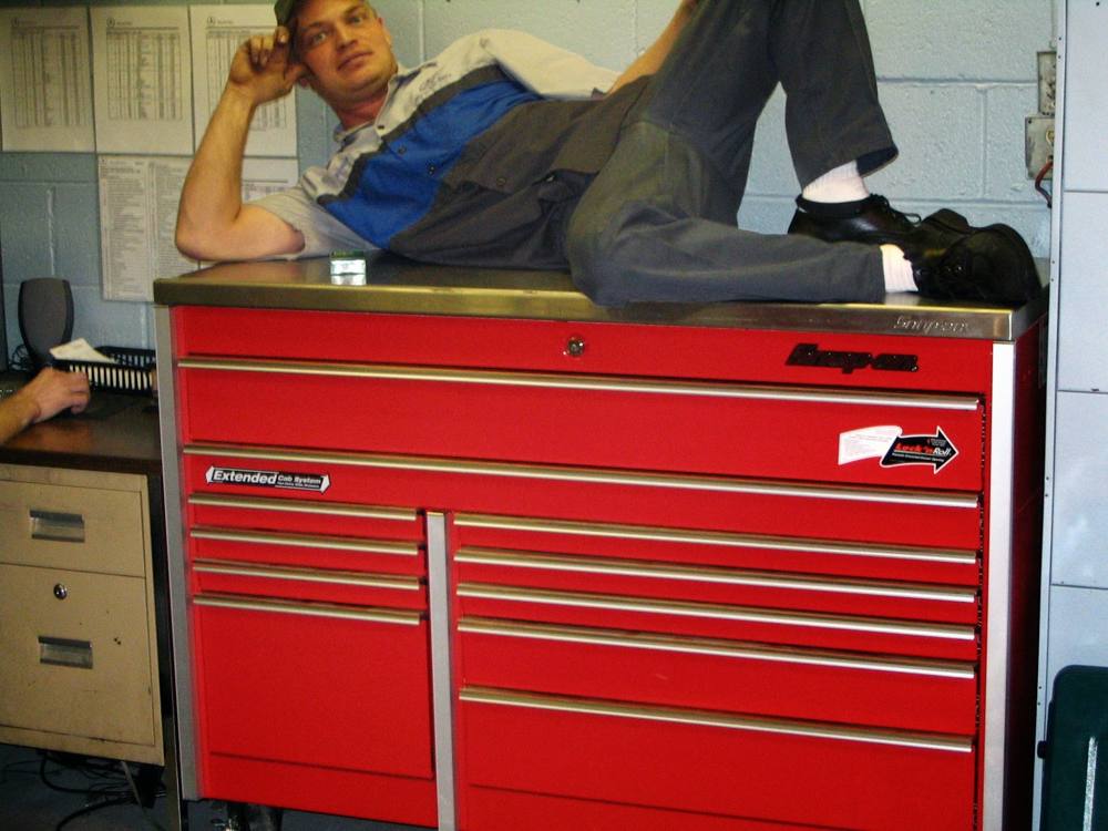 Robert Kious with his red rolling tool chest